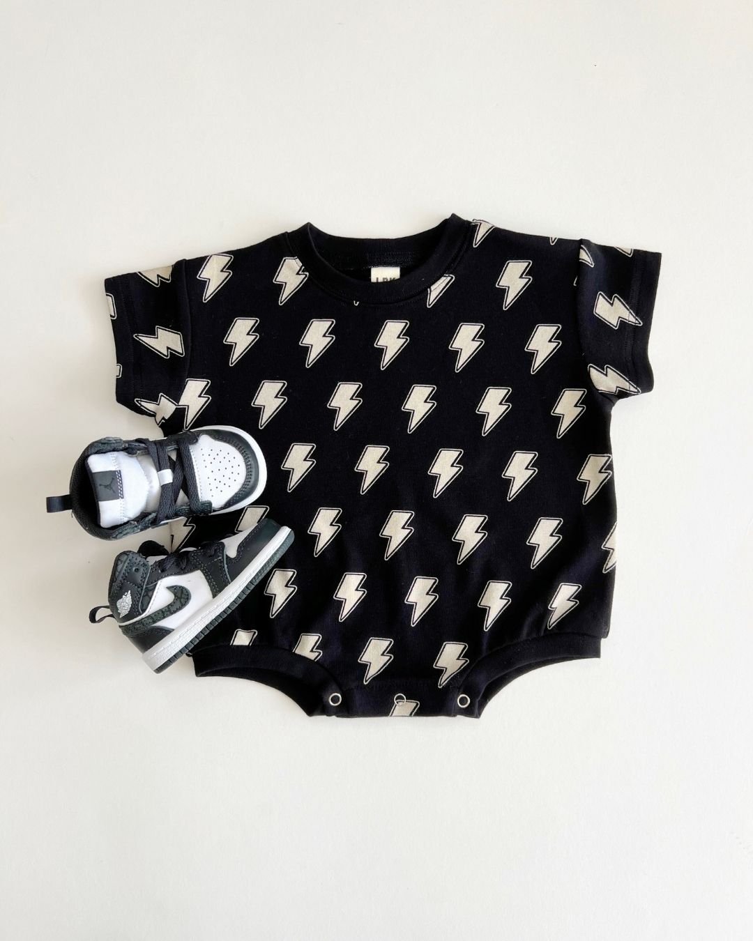 Short Sleeve Bubble Romper | Black Bolts - LUCKY PANDA KIDS