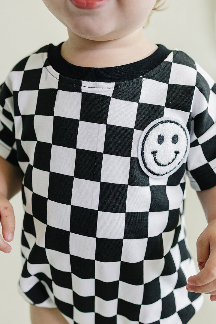 Short Sleeve Bubble Romper | Checkered Smiley Black