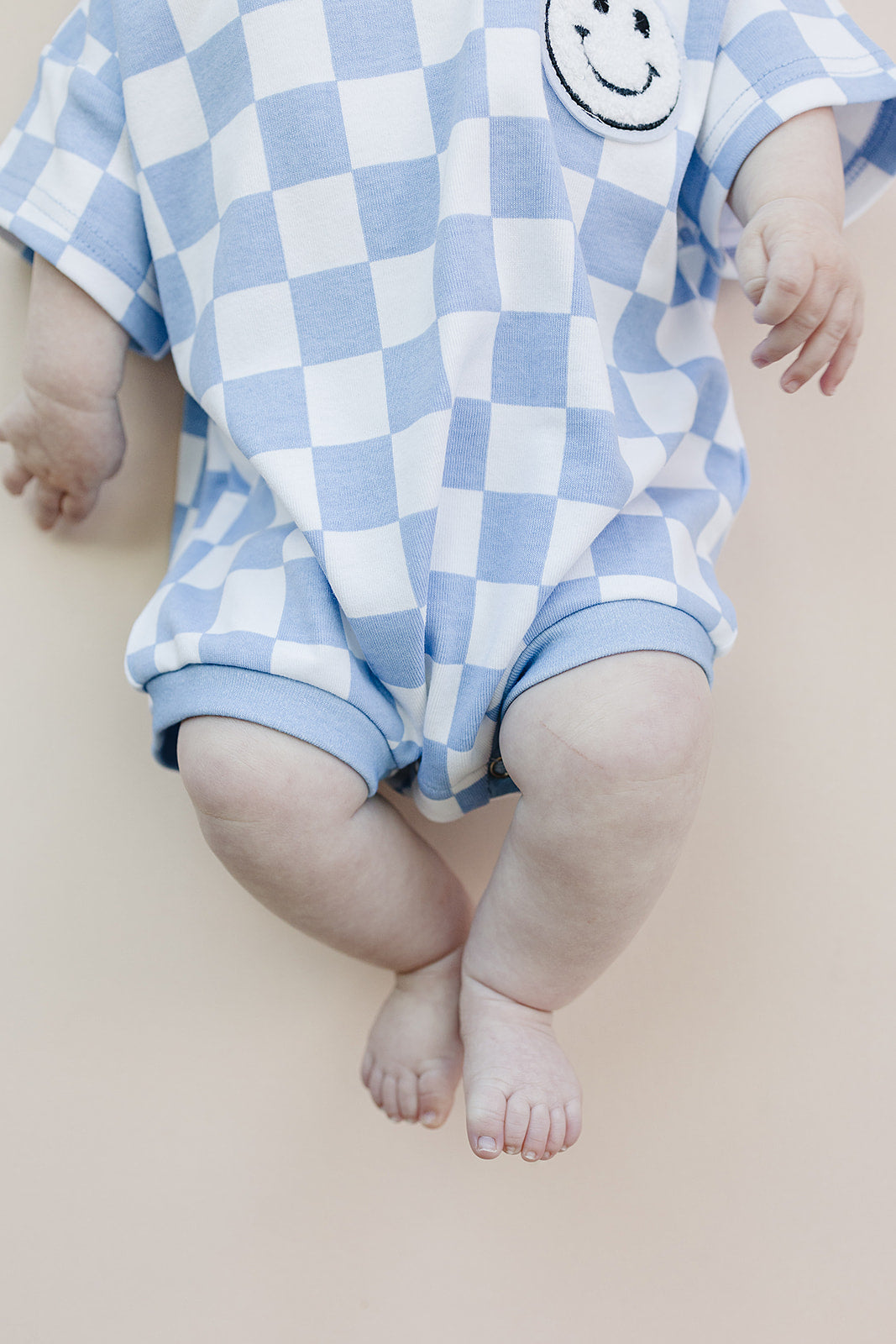 Short Sleeve Bubble Romper | Checkered Smiley Blue