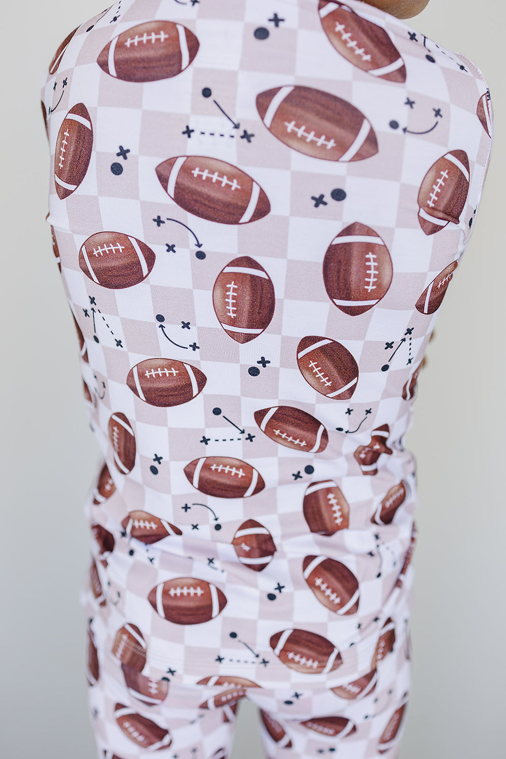 Bamboo pajamas with football pattern on a checkered background
