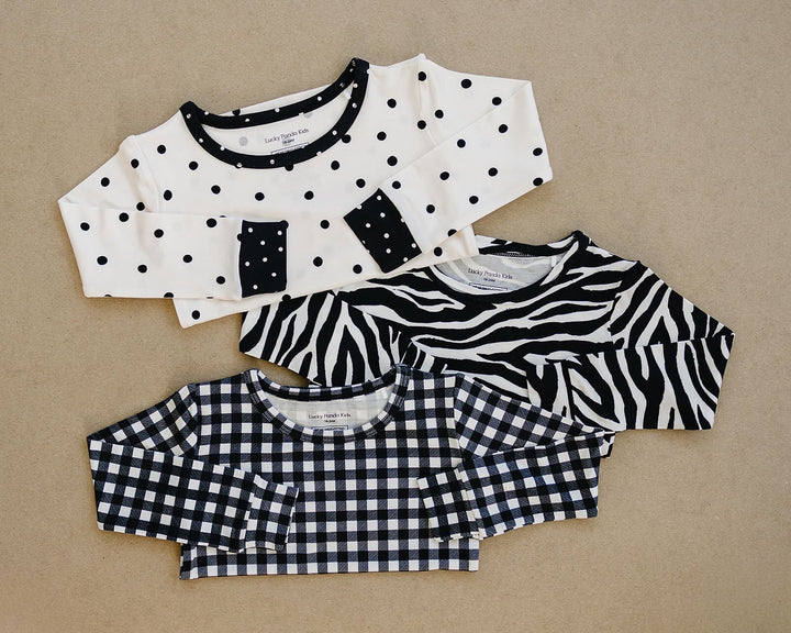 Classic Polka, Zebra, and Black Gingham Lucky Panda Kids styles shown together