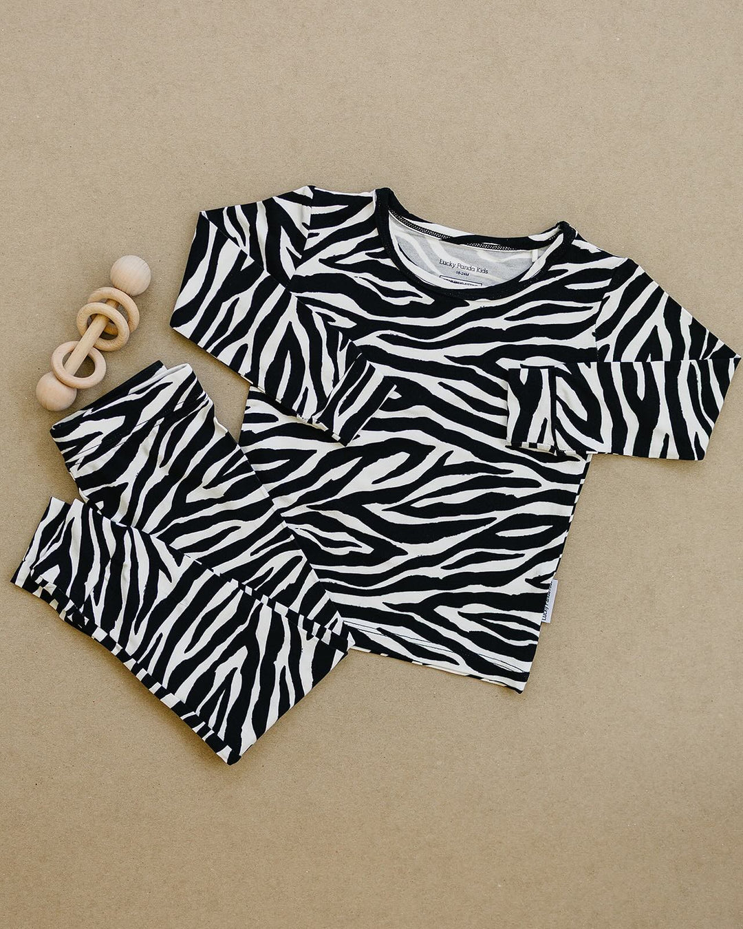 Zebra Bamboo Two Piece Set flat lay with matching long sleeve top and pants
