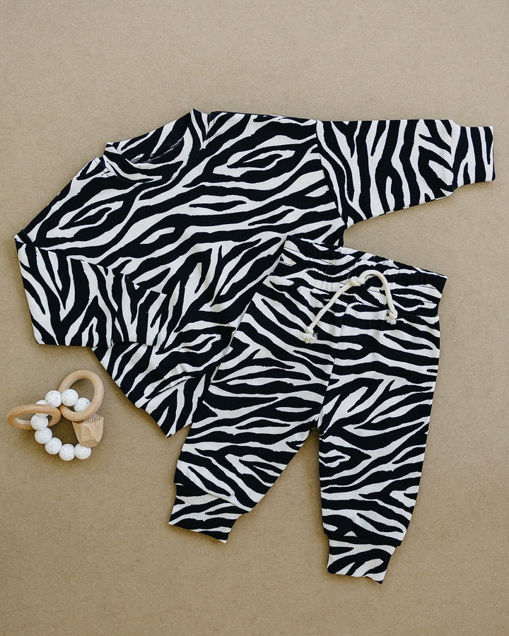 Zebra Jogger Set flat lay with matching long sleeve top and jogger pants
