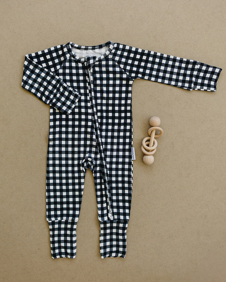 Black Gingham Bamboo Zip Romper flat lay showing the full one piece design