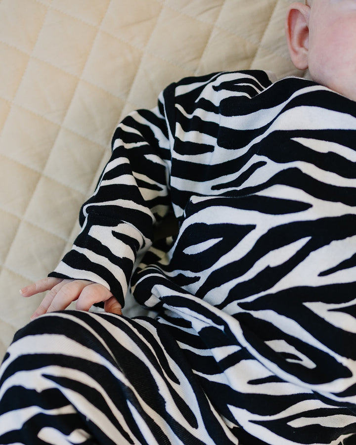 Close up of little one wearing the Zebra Jogger Set