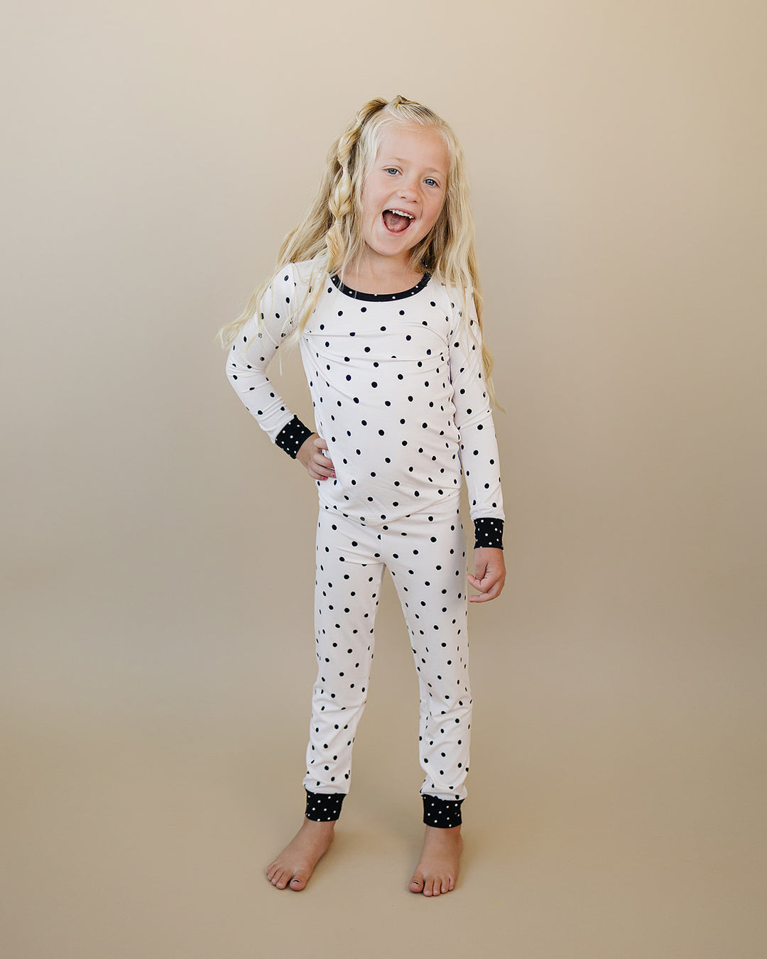 Little one modeling the Classic Polka Bamboo Two Piece Set