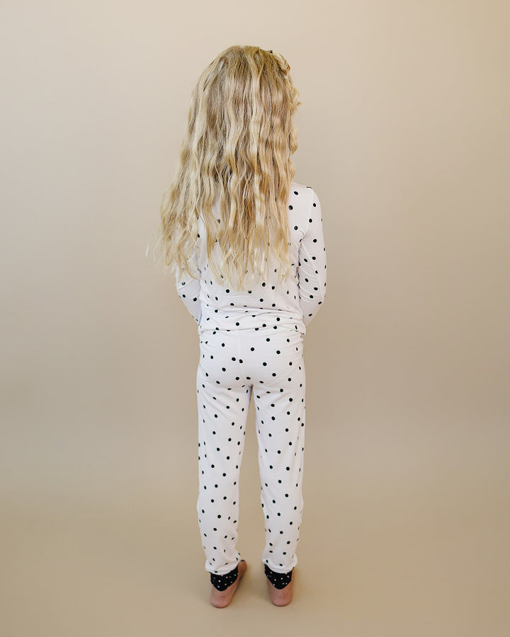 Back view of little one wearing the Classic Polka Bamboo Two Piece Set