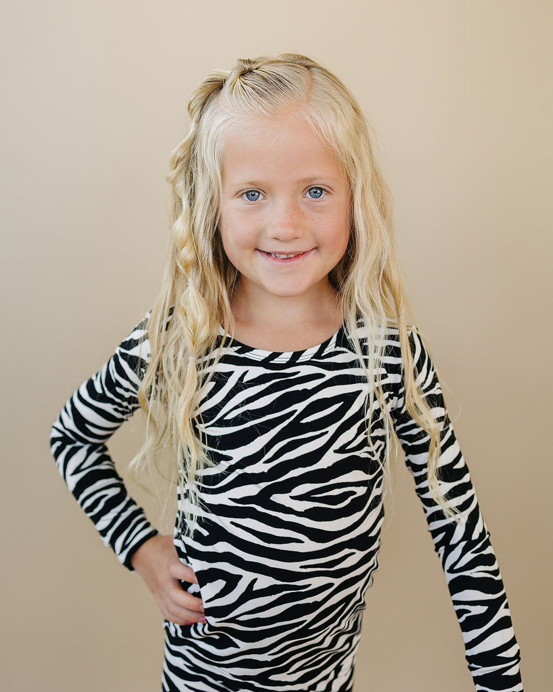 Little one wearing the Zebra Bamboo Two Piece Set with bold black and white print