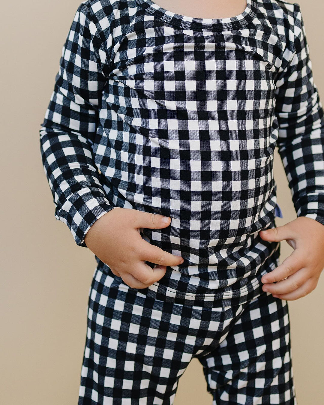 Close up of the Black Gingham Bamboo Two Piece Set showing the check print and fit