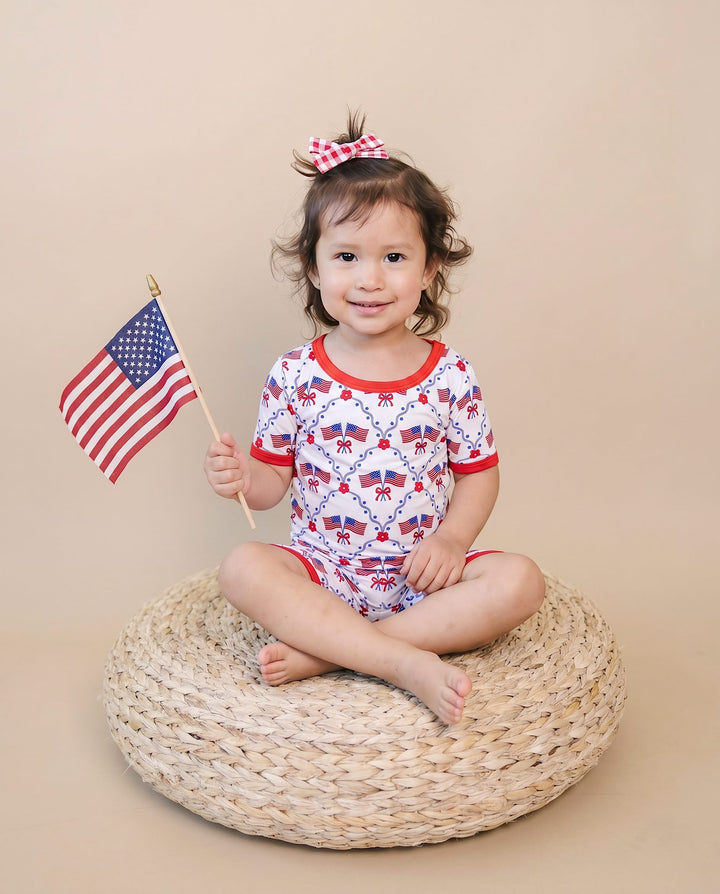 Toddler girl wearing Lucky Panda Kids Bamboo Shorts Set American Girl — patriotic 4th of July two-piece outfit
