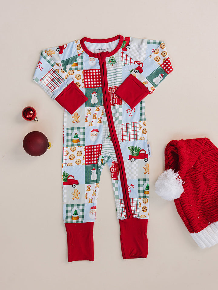 Christmas Patchwork Bamboo Zippy — patchwork Christmas romper, flat lay Lucky Panda Kids