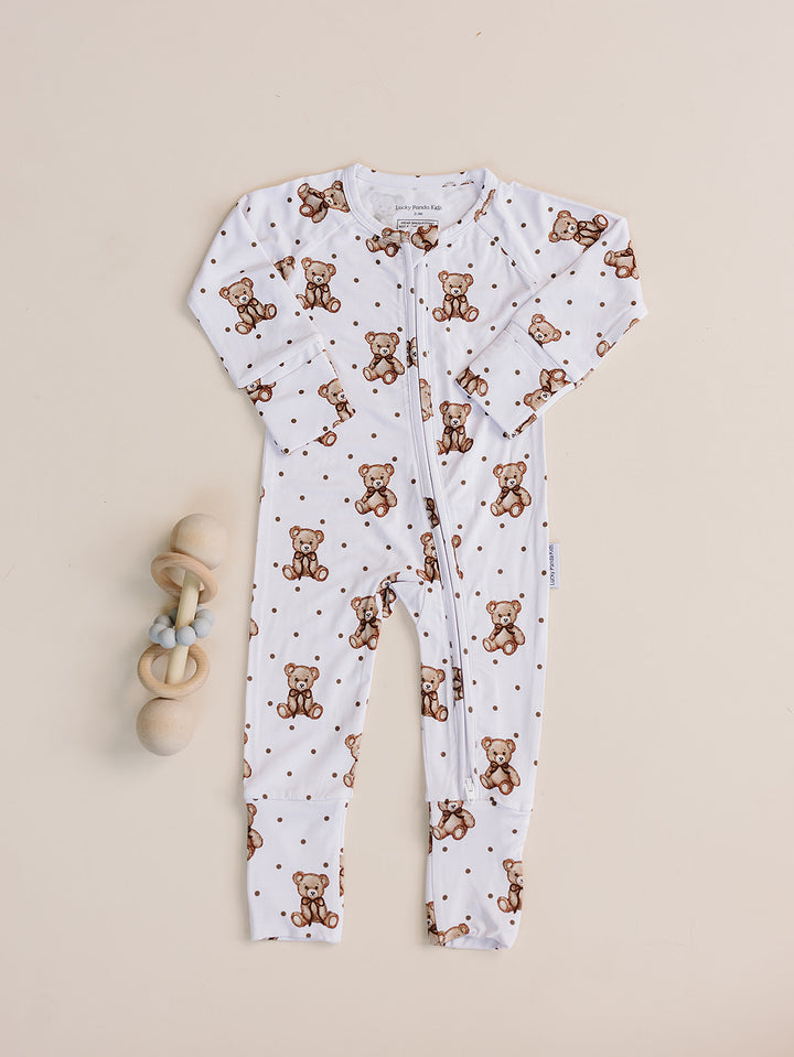 White Cute Bear bamboo zip romper with an all-over teddy bear print displayed flat.