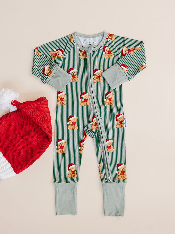 Merry Bear Bamboo Zippy — baby in Santa hat bear print Christmas romper, Lucky Panda Kids, flat lay
