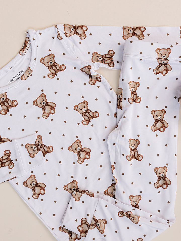 White Cute Bear bamboo two-piece set with a teddy bear and polka-dot print displayed flat.