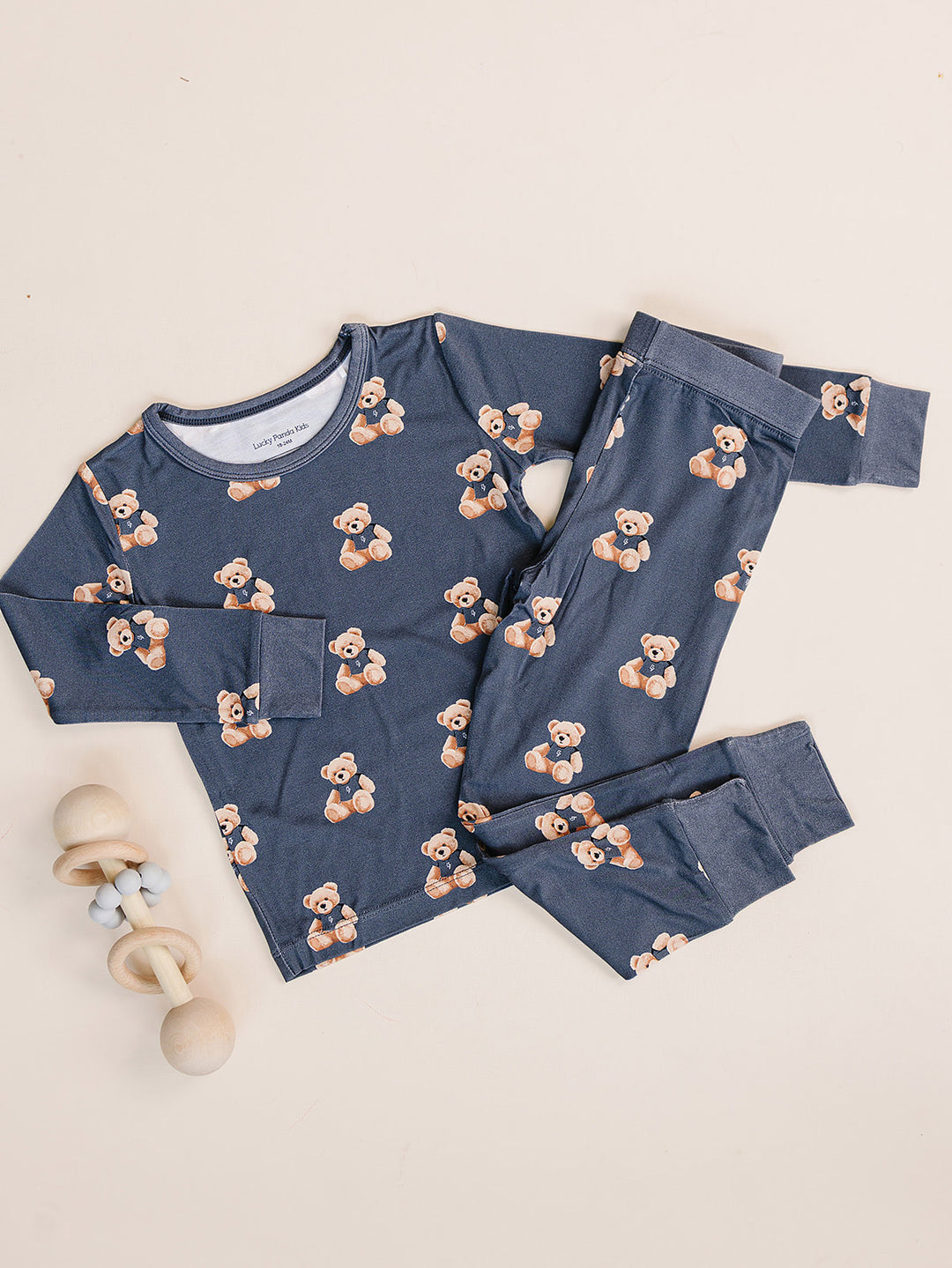 Dark charcoal Bear Vibes bamboo two-piece set with a short-sleeve top and matching pants displayed flat.