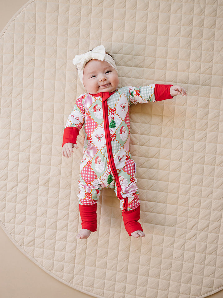  Christmas Patchwork Bamboo Zippy — baby in patchwork Christmas romper, Lucky Panda Kids
