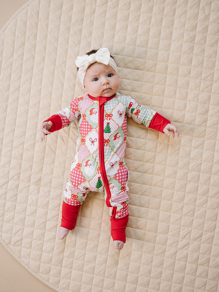  Christmas Patchwork Bamboo Zippy — baby in patchwork Christmas romper, Lucky Panda Kids
