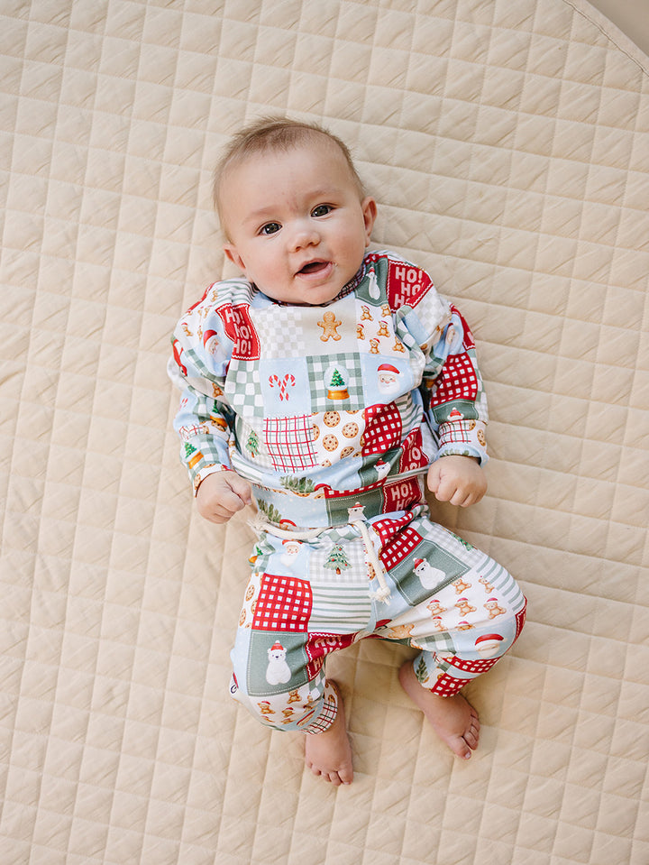 Christmas Patchwork Bamboo Two Piece — toddler boy in patchwork Christmas pajama set, Lucky Panda Kids

