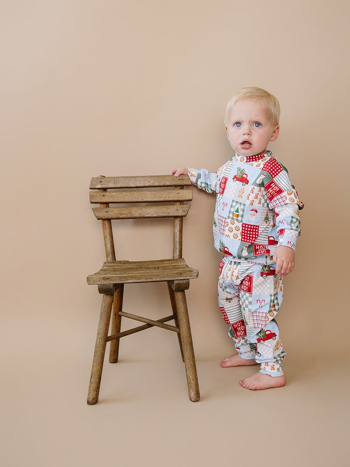 Christmas Patchwork Jogger Set — toddler boy in patchwork Christmas pajama set, Lucky Panda Kids