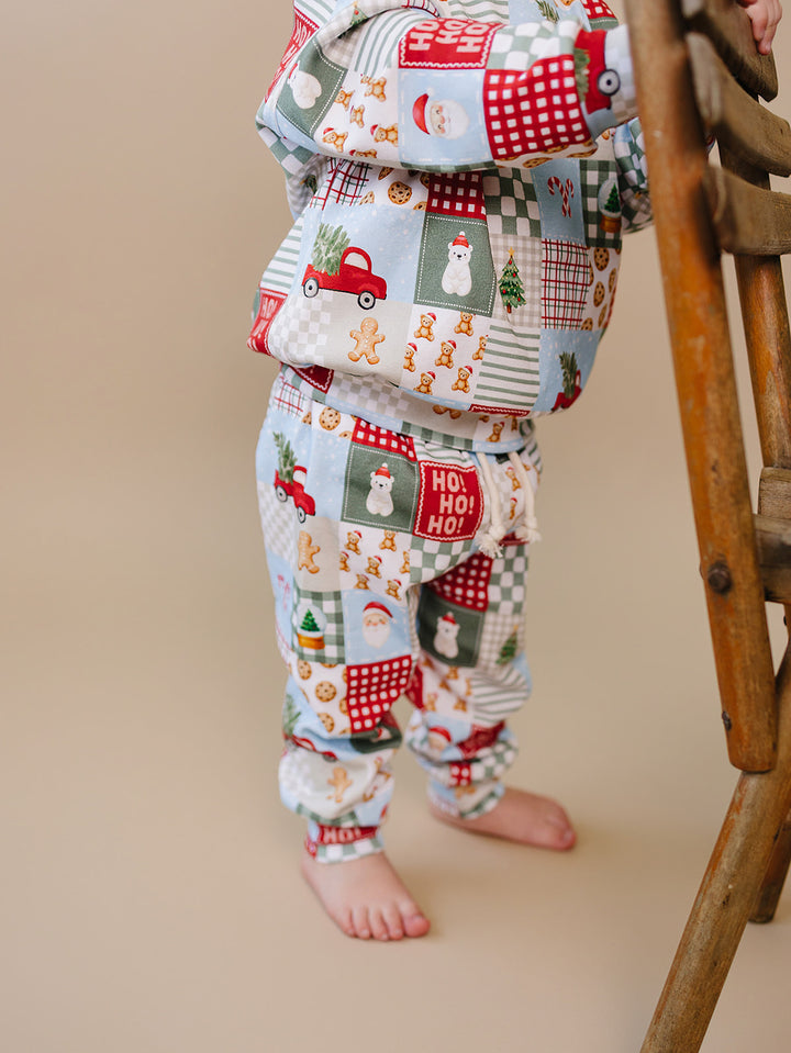 Christmas Patchwork Jogger Set — toddler boy in patchwork Christmas pajama set, Lucky Panda Kids