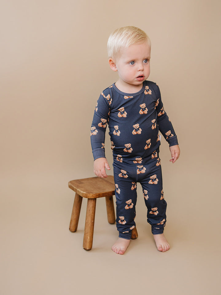 Full-length view of a toddler wearing the Bear Vibes short-sleeve top and matching pants.