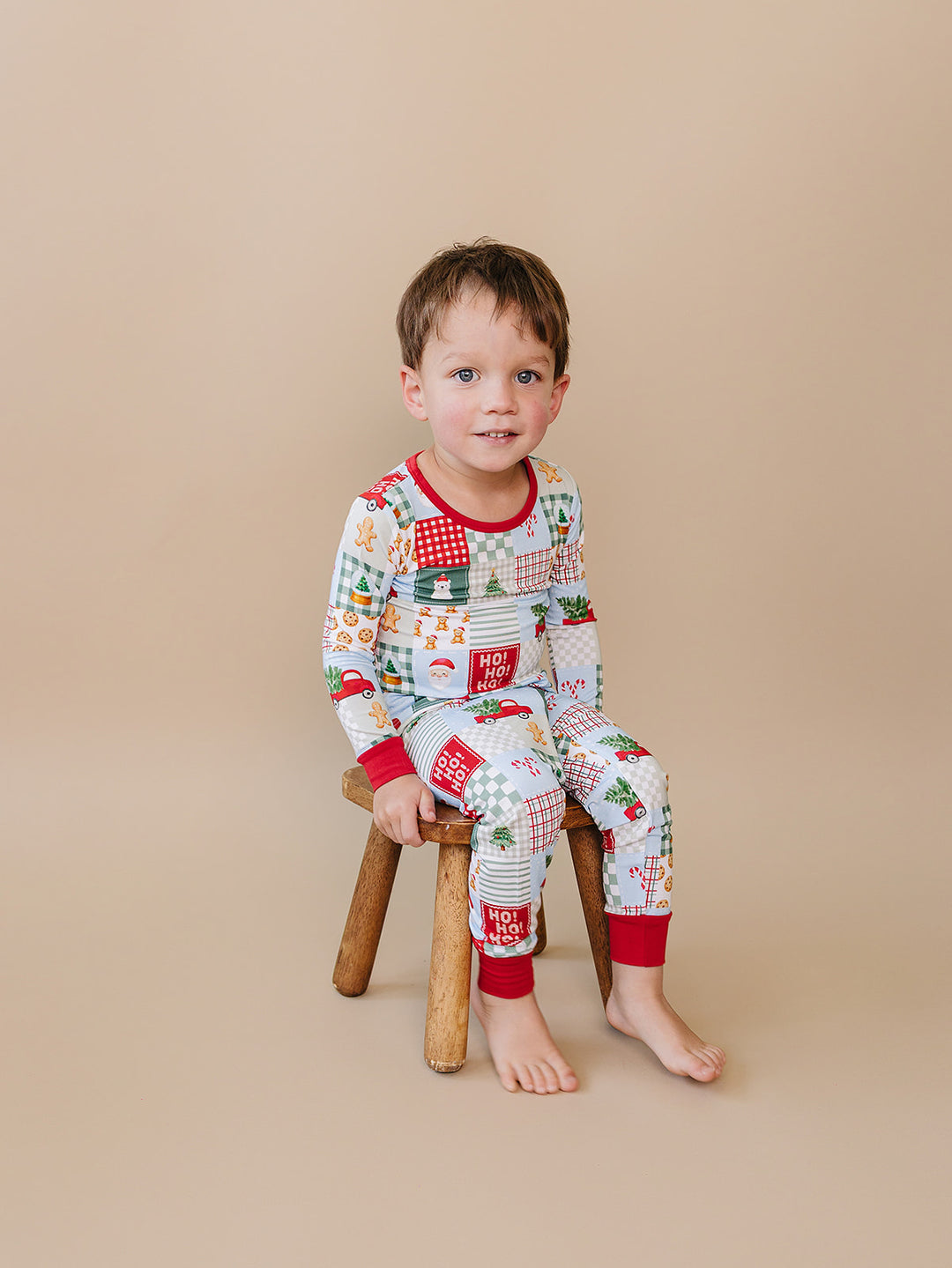  Christmas Patchwork Bamboo Two Piece — toddler boy in patchwork Christmas pajama set, Lucky Panda Kids
