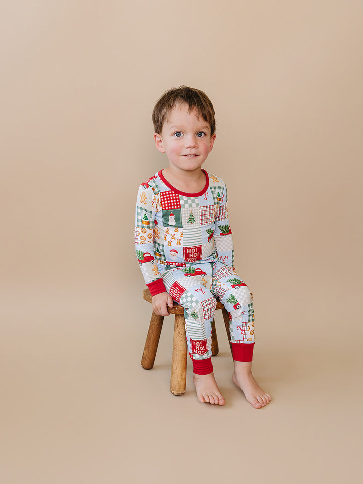 Christmas Patchwork Bamboo Two Piece — toddler boy in patchwork Christmas pajama set, Lucky Panda Kids
