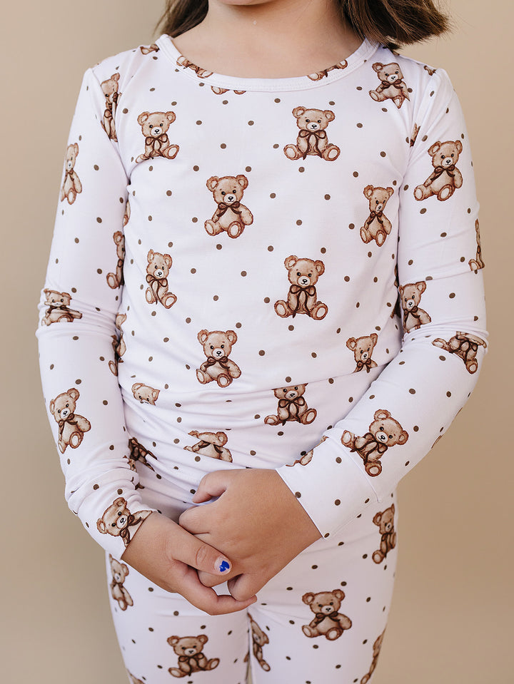Close-up of the teddy bear and polka-dot print on the Cute Bear bamboo top.