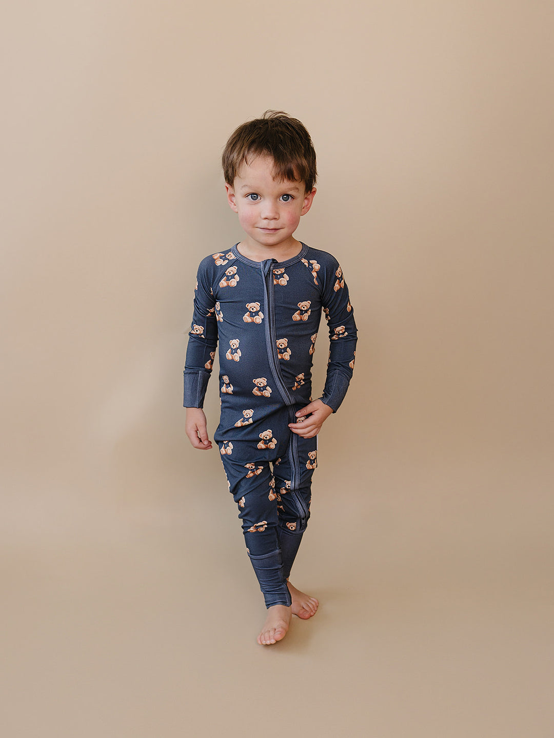 Child modeling the coordinating dark charcoal Bear Vibes jogger set.