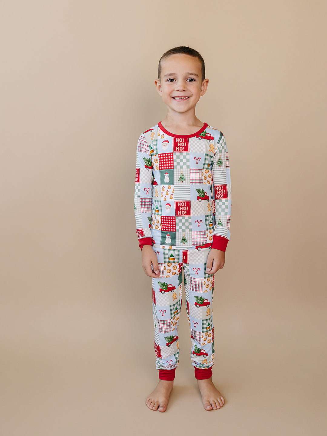  Christmas Patchwork Bamboo Two Piece — toddler boy in patchwork Christmas pajama set, Lucky Panda Kids
