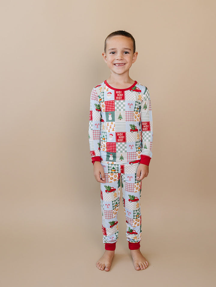  Christmas Patchwork Bamboo Two Piece — toddler boy in patchwork Christmas pajama set, Lucky Panda Kids
