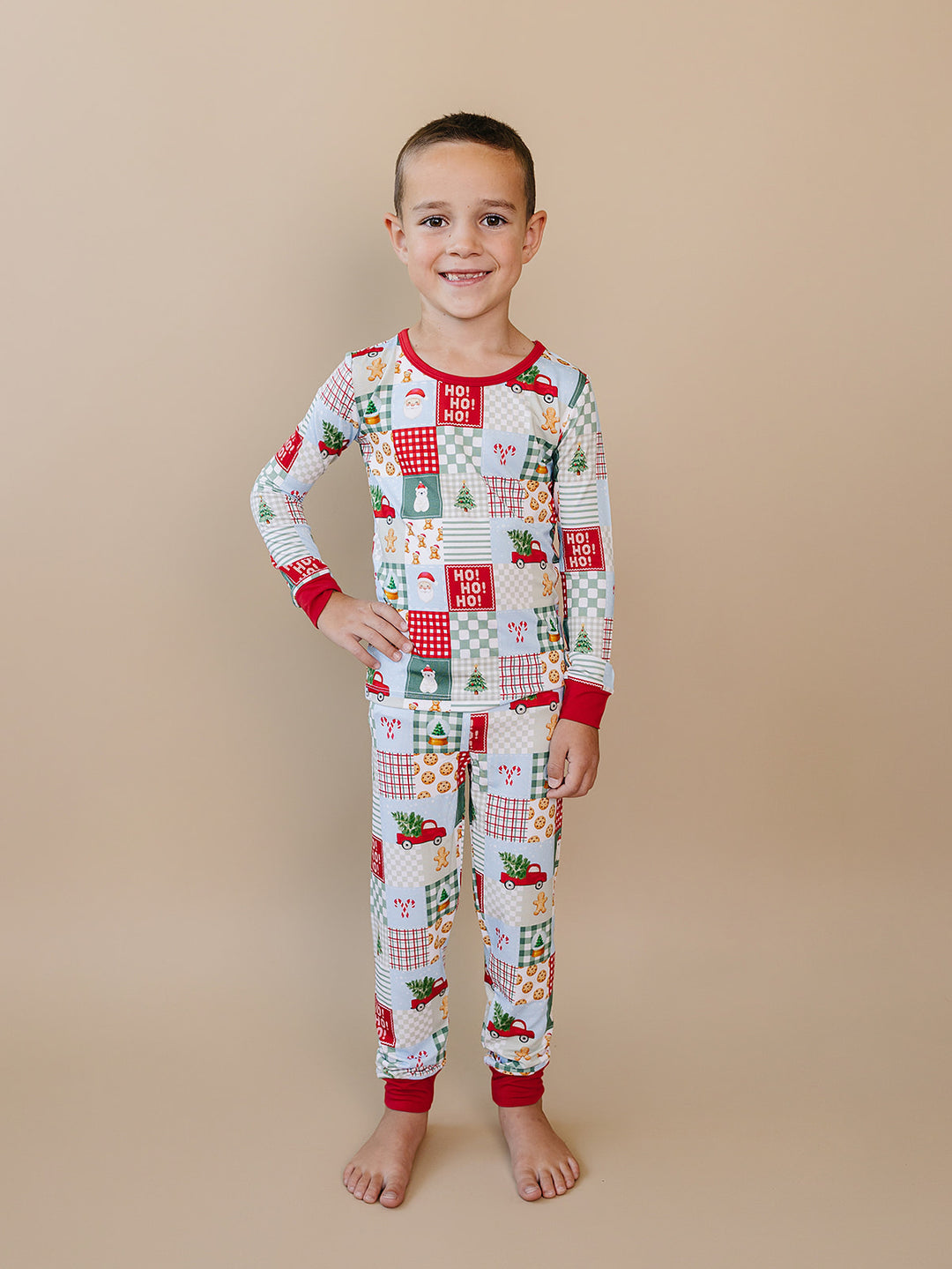  Christmas Patchwork Bamboo Two Piece — toddler boy in patchwork Christmas pajama set, Lucky Panda Kids
