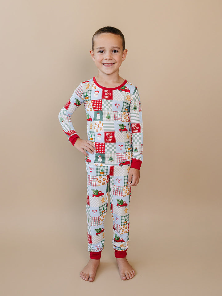  Christmas Patchwork Bamboo Two Piece — toddler boy in patchwork Christmas pajama set, Lucky Panda Kids
