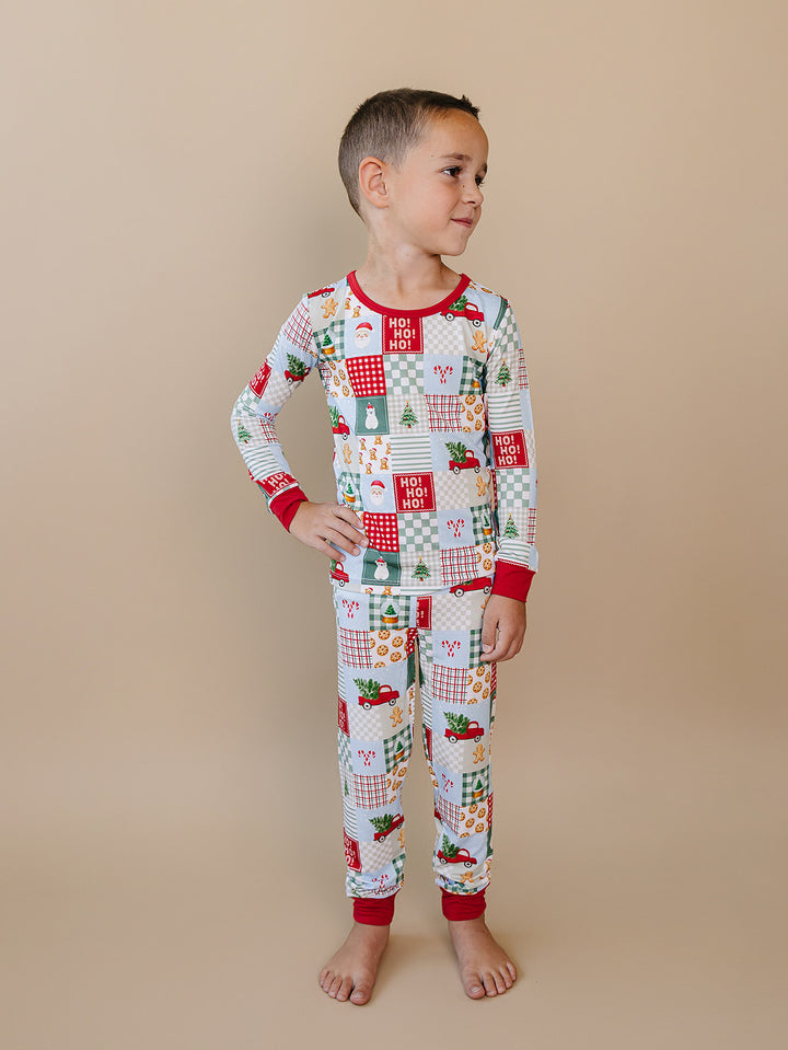  Christmas Patchwork Bamboo Two Piece — toddler boy in patchwork Christmas pajama set, Lucky Panda Kids
