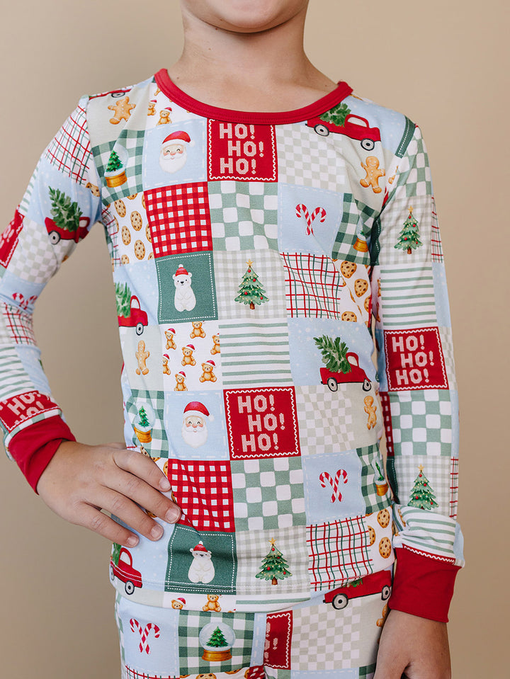  Christmas Patchwork Bamboo Two Piece — toddler boy in patchwork Christmas pajama set, Lucky Panda Kids
