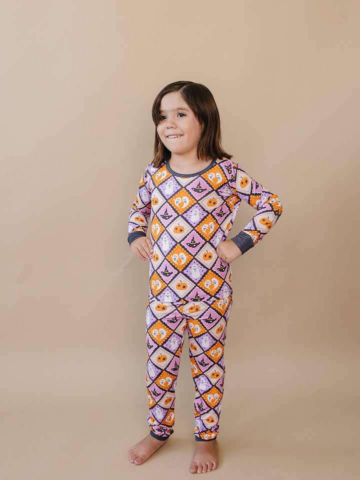 Full-length view of a girl wearing the Ghost Whimsy Bamboo Two Piece Set.