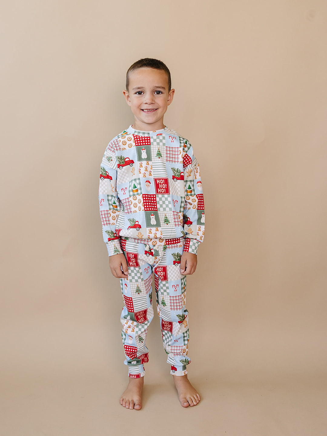 Christmas Patchwork Jogger Set — toddler boy in patchwork Christmas pajama set, Lucky Panda Kids