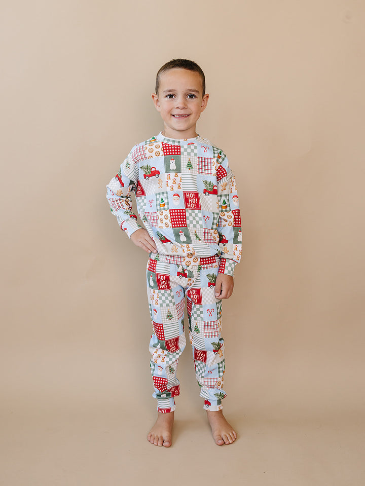 Christmas Patchwork Jogger Set — toddler boy in patchwork Christmas pajama set, Lucky Panda Kids
