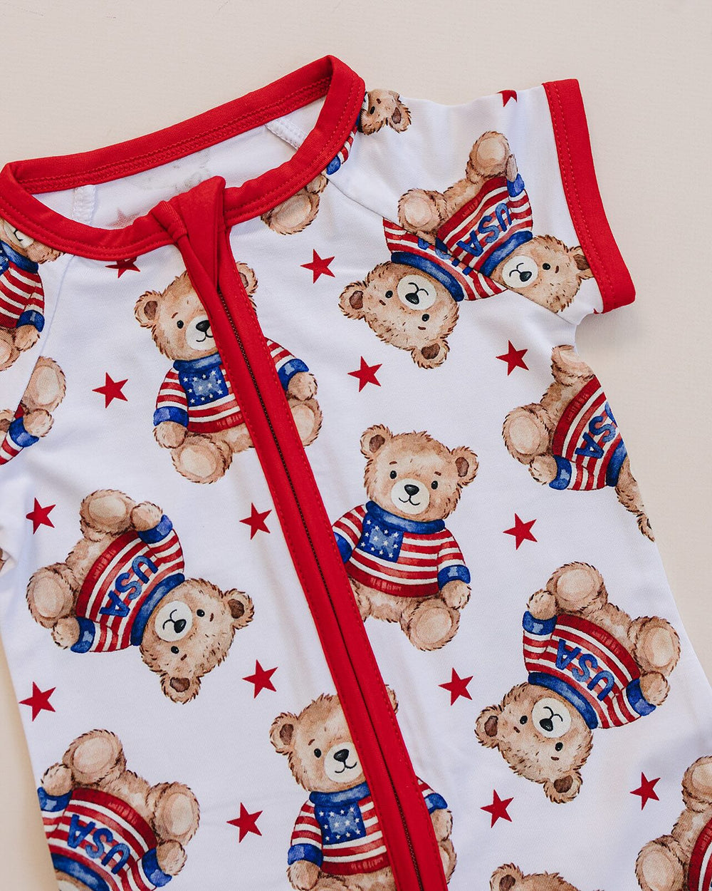 Close-up of Lucky Panda Kids American Bear bamboo romper — soft 220 GSM bamboo, patriotic bear print