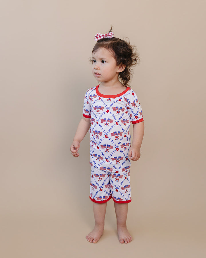 Toddler girl wearing Lucky Panda Kids Bamboo Shorts Set American Girl — patriotic 4th of July two-piece outfit