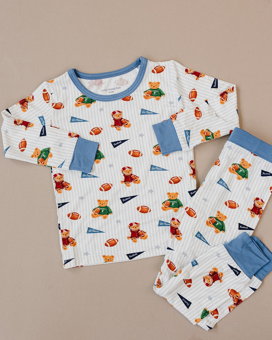 Touchdown Teddy bamboo long-sleeve top and matching pants displayed as a flat lay.