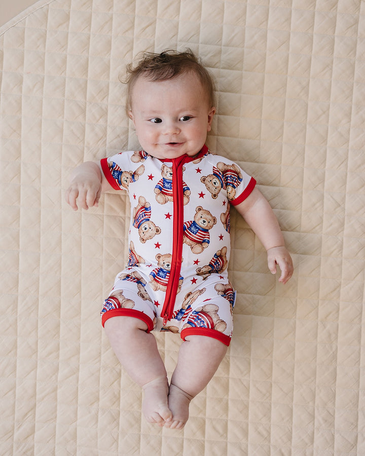 Baby boy wearing Lucky Panda Kids Bamboo Shorty Romper American Bear — patriotic 4th of July baby boy outfit