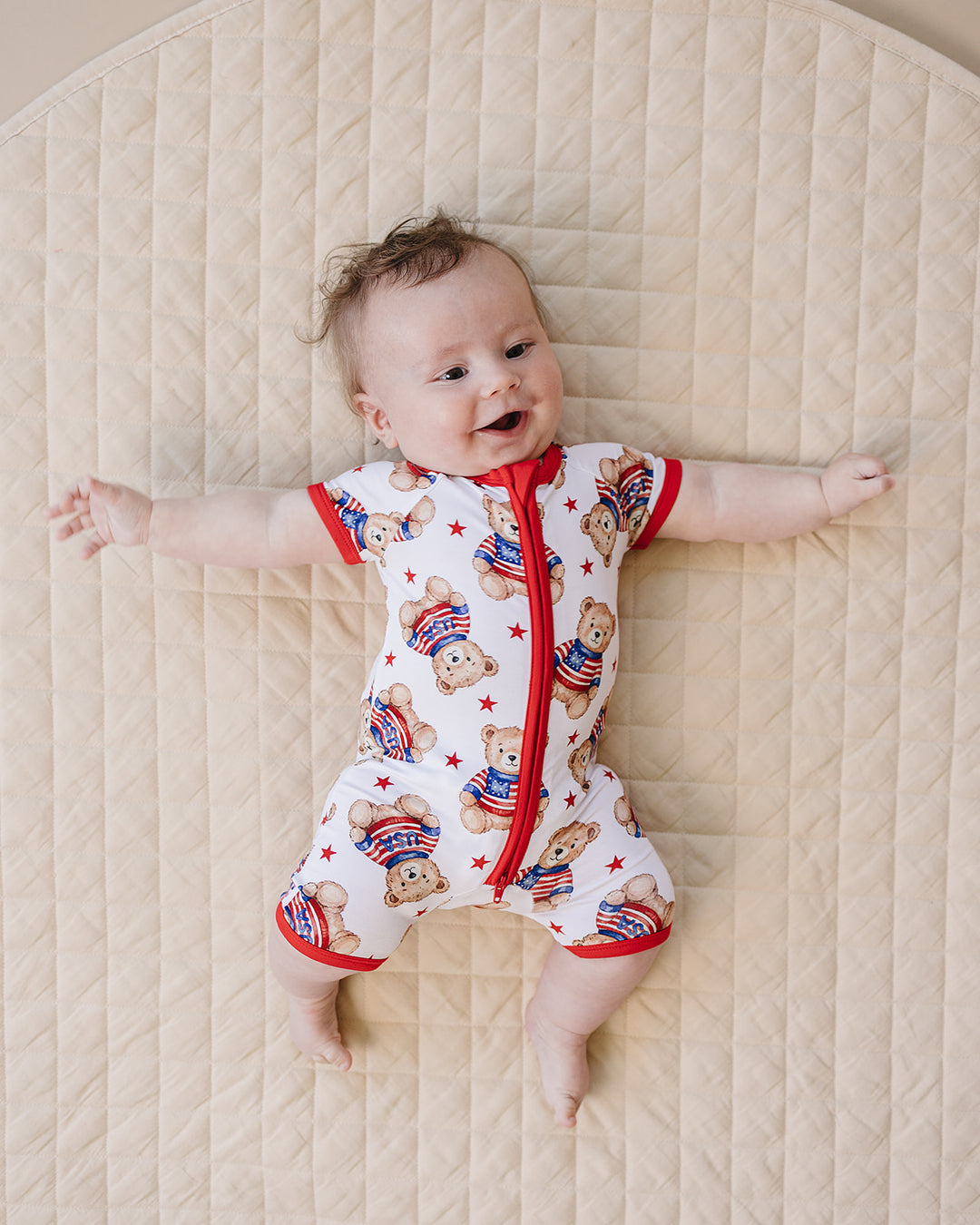 Baby boy wearing Lucky Panda Kids Bamboo Shorty Romper American Bear — patriotic 4th of July baby boy outfit