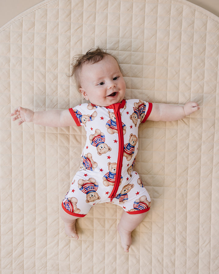 Baby boy wearing Lucky Panda Kids Bamboo Shorty Romper American Bear — patriotic 4th of July baby boy outfit