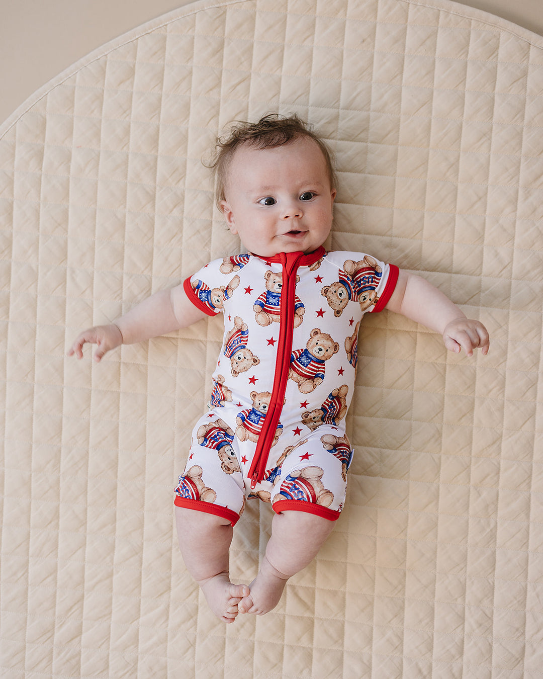 Baby boy wearing Lucky Panda Kids Bamboo Shorty Romper American Bear — patriotic 4th of July baby boy outfit