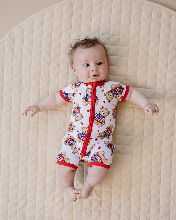 Baby boy wearing Lucky Panda Kids Bamboo Shorty Romper American Bear — patriotic 4th of July baby boy outfit