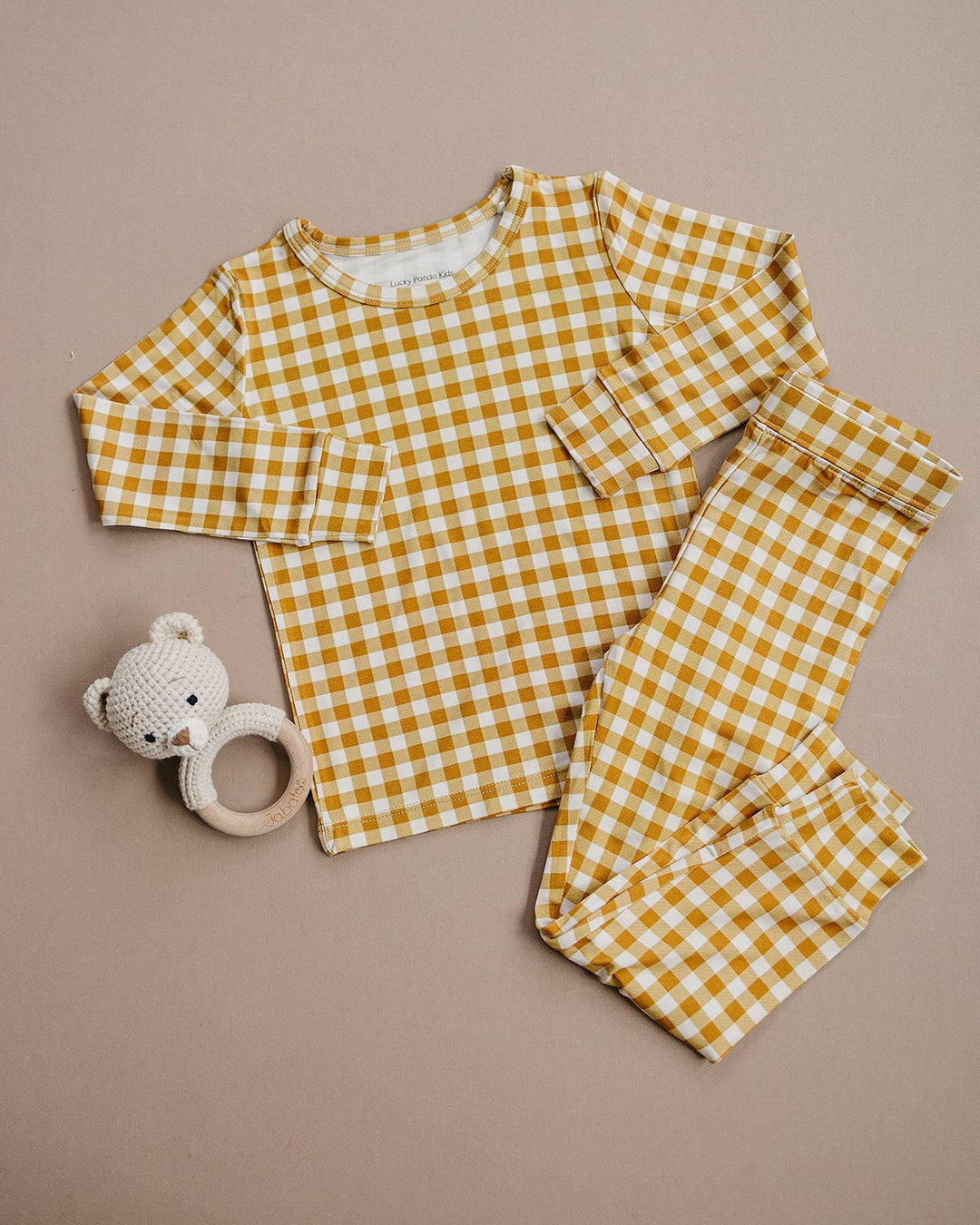 Lucky Panda Kids Yellow Gingham bamboo long-sleeve top and matching pajama pants displayed flat.