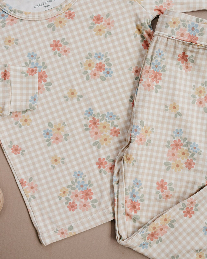 Close-up of the Wild Flower bamboo pajama pants, showing the pastel floral gingham print.