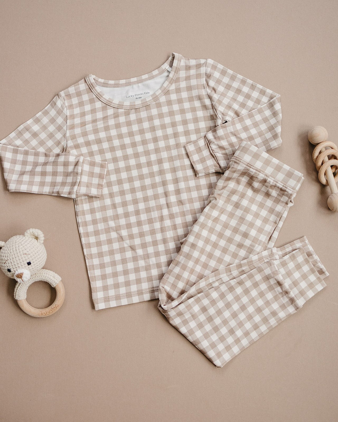 Lucky Panda Kids Beige Gingham bamboo long-sleeve top and matching pajama pants displayed flat.