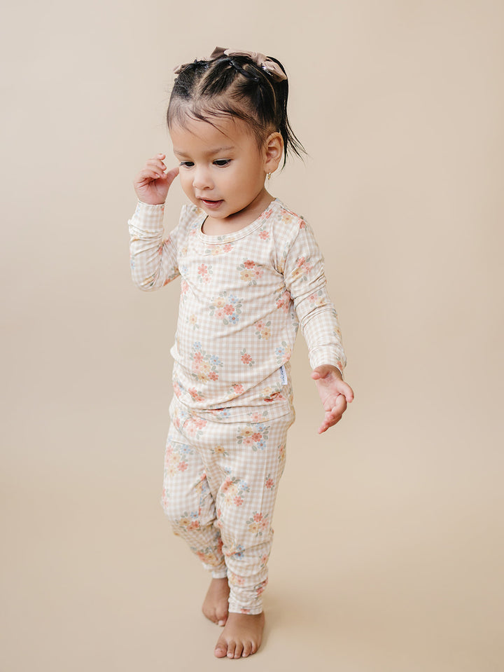 Close-up of the Wild Flower bamboo pajama pants, showing the pastel floral gingham print.
